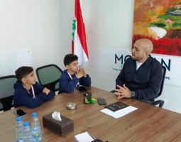 الصيدلي عمر مرجان يهنّئ البطلين آدم وأمير السن لإحرازهما بطولة آسيا للفنون القتالية المختلطة